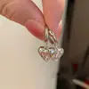 Pendientes de Colgante Exquisitos y de Moda con Forma de Corazón, Diseño Elegante y Moderno, Sensación Simple y de Alta Gama, Pendientes Versátiles para Mujer, Venta al por Mayor de Gran Éxito