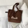 Bolso de gamuza para mujer, nueva colección de otoño 2026, bolso de hombro elegante y versátil, bolso tote de gran capacidad, bolso rojo de boda