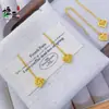 Tienda de Oro Mismo Estilo Hielo Triturado Brillante Trébol de Cuatro Hojas Corazón Moneda Hilo para Oreja Pendientes para Mujer, Nueva Moda Lujo Ligero Pendientes de Uso Diario
