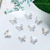 Nueva joyería de manicura Yiwu, deseo puro, tulipán salvaje, mariposa, joyería de manicura, decoraciones de manicura luminosas, venta al por mayor