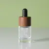 Botella de Vidrio Transparente con Gotero de 5ml-15ml Botella Dispensadora de Solución Madre de Esencia Cosméticos Tapa de Madera Gotero de Aceite Esencial Botella Vacía