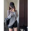 Camiseta a rayas de manga larga, hombros descubiertos, corte holgado, relajada y adelgazante, estilo coreano, para mujer, nueva para principios de otoño