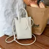 Bolso Cubo de Moda de Nicho para Mujer, Bolso de Hombro Casual Retro Simple, Nuevo Bolso Cruzado para Teléfono con Patrón Tejido 2026