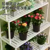 Suporte de flores de chão, móvel, com vários níveis para uso interno, adequado para varandas, salas de estar e pátios externos.; vem com rodas