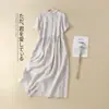 Foto Real de Vestido Camisero Casual Holgado de Manga Corta de Color Sólido de Algodón y Lino Estilo Nuevo Verano 2026 para Mujer, de Longitud Media