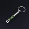 Chaveiro de Modificação de Carro Transfronteiriço Amortecedor Pequeno Presente Chaveiro de Metal Capacete Semáforo Rotor Atacado