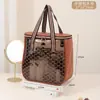 Bolso de maquillaje nuevo de moda de gran capacidad en cuero PU, bolsa de almacenamiento portátil transfronteriza para viajes, impermeable y lavable