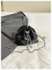 2026 Nuevo Estilo Moda Femenina Bolso de Hombro de Alta Calidad Casual Versátil Cadena Cruzado Cubo Estilo de Nicho