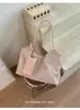 Bolso de lona de gran capacidad con estampado de leopardo, estilo nicho, para mujer, nuevo modelo 2026, bolso tote informal transfronterizo, estilo perezoso, para ir al trabajo