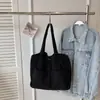 Bolso tote de pana de gran capacidad para mujer, nuevo modelo 2026, bolso de mano casual de color liso, bolso de hombro con cordón moderno, comercio exterior