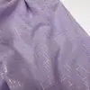 Nuevo tejido de gasa con rayas en relieve dorado y líneas geométricas, adecuado para decoraciones de bodas, cortinas, accesorios y materiales de confección.