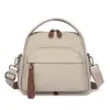 Bolso de Hombro Versátil para Mujer Popular Transfronterizo Simple y Elegante Hecho de Nailon con Acabado de Alta Gama y Gran Capacidad para el Viaje Diario Bolso Cruzado