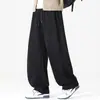 Pantalones de chándal retro minimalistas de pierna curva, nueva colección otoño/invierno para hombre, con un corte relajado y holgado, y diseño de pierna ancha para un look cómodo y casual. Disponible en tallas grandes