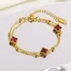 Pulsera de doble capa de cuatro hojas más vendida transfronteriza para mujer, estilo coreano personalizado, fresca, simple, dulce, linda, de acero inoxidable, moderna para el trabajo