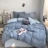 Juego de cuatro piezas de algodón lavado doble de color sólido Ropa de cama estilo Ins Sábanas Cubre edredón Juego de tres piezas para dormitorio de estudiantes Suave y ceroso
