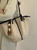 Bolso tote tejido estilo francés transfronterizo para mujer, nuevo bolso de hombro de nicho de moda 2026, bolso simple de gran capacidad para madre e hija