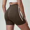 Pantalones cortos de entrenamiento de yoga de tres cuartos de alta elasticidad, control de abdomen, color sólido y bloques de color, transfronterizos europeos y americanos, para ciclismo al aire libre, pantalones cortos de melocotón