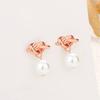 Versión coreana de s925 al por mayor aretes de plata esterlina con lazo enrollado aretes de diseño nicho exquisitos de alta gama japoneses y coreanos plata esterlina