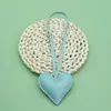 Accesorios Populares Americanos Corazón de Melocotón Colgante Cuero Coche Cuerda de Mano Simple Bolsa Ropa DIY Mochila de Pareja Llave