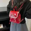 Mochila de encaje de doble hombro, nuevo estilo de uso diario, mochila de lazo para la universidad, cordón, para clase y desplazamientos, versión coreana para mujer 2026, dulce