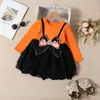 Vestido de Halloween para meninas transfronteiriço, falso duas peças, vestido de manga comprida com decoração de laço, saia preta de tule fofo