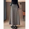 Nueva falda de mujer a rayas 2026 otoño cintura alta adelgazante fluida moda lujo ligero línea A casual larga
