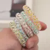 Diadema de línea telefónica de puntos transparentes Cuerda para el pelo gruesa de alta elasticidad con lunares Atadura para coleta Bola en la cabeza Accesorios para el cabello Amazon