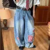 Calça jeans patchwork xadrez rasgada para homens e mulheres, calça de marca moderna de corte reto largo, calça comprida até o chão