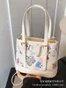 Bolsas de Nicho de Alta Gama para Mujer 2025 Nueva Moda Tendencia Versátil Bolso de Hombro Cruzado Bolso Cubo de Mano de Lujo Ligero