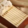 Pendientes Elegantes de Hilo para Oreja Estilo Coreano Estilo Ins Modelo Nuevo Incrustados con Diamantes Patrón de Espina de Pez Nube Acero de Titanio Chapado en Oro de 24K con Cierre de Rosca