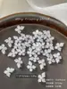 Decoraciones para uñas de flor de cristal de hielo tallada suave, modernas y versátiles, blanco translúcido, flor de cuatro pétalos tridimensional para decoración de uñas, pedrería de resina, al por mayor