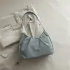 Bolsa de ombro feminina, simples e versátil, versão coreana de nicho 2026, bolsa de axila plissada suave de cor sólida, bolsa minimalista