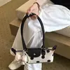 Bolso de axila de nicho estilo coreano para mujer, nuevo bolso de mano de moda transfronterizo, elegante y simple bolso de hombro de lunares para viajar