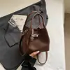 Bolso de Mano Casual de Moda de Nicho Nuevo Verano 2026 Shuai Mijia para Mujer, Bolso Cubo Estilo Coreano, Elegante Bolso Cruzado