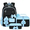 Nueva mochila transfronteriza para estudiantes de primaria, lindo conjunto de tres piezas con lazo, mochila escolar para niñas, gran capacidad, mochila reductora de peso