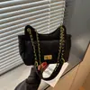 Bolso de hombro acolchado con cadena estilo Chanel 2026, de alta gama y elegante, versátil para llevar al hombro y cruzado