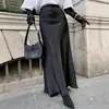 Falda de satén de cintura alta, moda línea A europea y americana, imitación de verano, venta al por mayor transfronteriza, estilo francés, falda larga 2025, elegante acetato