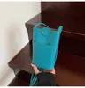 2026 Novo Produto Atacado: Bolsa de Celular Simples, Casual e Versátil com Textura de Lichia da Moda, Bolsa Transversal Elegante para o Dia a Dia de Mulheres