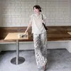 Verão 2026 Nova Moda Casual Emagrecedor Rejuvenescedor Novo Estilo Chinês Leve Estilo Nacional Conjunto de Top + Calça de Pernas Largas Tendência