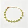 Pulseras de flor de acero de titanio con incrustaciones de diamantes, las más vendidas en Europa y América, accesorios de lujo ligero de nicho, cadenas para la clavícula, pulseras de trébol de cuatro hojas, venta al por mayor desde el fabricante