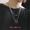 Collar de cruz apilada de doble capa de hip-hop transfronterizo europeo y americano para hombre, diseño de nicho moderno, cadena cubana con sentido de acero de titanio a juego.