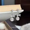 Brincos Pingente Manta Pérola Rosa Laço Estilo Coreano com Design de Nicho de Alto Padrão, Novos Brincos Populares com Hastes de Prata