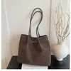 Bolso tote simple mate para mujer, nuevo estilo otoño e invierno 2025, bolso de hombro versátil vintage, bolso de mano para el trabajo