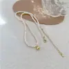 Collar de perlas pequeñas de agua dulce con forma para mujer, gargantilla, cadena para la clavícula de cuentas de arroz, frijol dorado retro, bolita de oro pequeña, cadena para la clavícula de perla