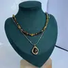 Collar Colgante de Piedra Ojo de Tigre Bañado en Oro Real Cadena de Clavícula Retro Maillard Joyería Versátil de Gama Alta de Nicho