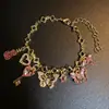 Pulsera de Violín con Mariposa Vintage