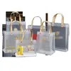 En stock Bolso de mano transparente de PVC Bolsa de regalo esmerilada de plástico PP Bolsa de embalaje para souvenirs Bolsa de regalo de dulces para festivales y bodas
