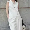 En stock al por mayor del fabricante 2026 nuevo diseño de moda para mujer, tapeta diagonal, cuello en V, chaleco blanco casual