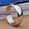 Tendencia europea y americana simple acero de titanio liso cómodo arco interior y exterior 6mm anillo fabricantes de joyería al por mayor