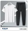 Nuevo Traje de Seda Helada de Verano para Hombre, Camiseta Deportiva Casual de Cuello Redondo, Conjunto de Pantalones Cortos de Manga Corta, Conjunto Deportivo Moderno y Versátil